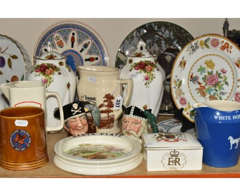 A GROUP OF NAMED CERAMICS, an early 20th century Carlton Ware 'Seesaw' nursery dish, two Wade Pottery pub advertising water j