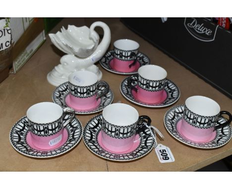 A SET OF SIX EDWARDIAN ROYAL WORCESTER 907 COFFEE CANS AND SAUCERS, featuring a black and white 'Rail and Chain' border and p