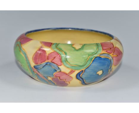 A CLARICE CLIFF FANTASQUE BIZARRE BOWL, in Blue Chintz pattern, painted with blue, pink and green flowers on a cream ground, 