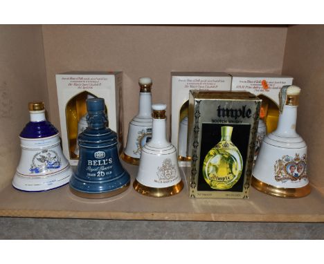 NINE DECANTERS/ BOTTLE OF  WHISKY comprising three BELL'S  Wade Decanters commemorating the 60th Birthday of Her Majesty Quee