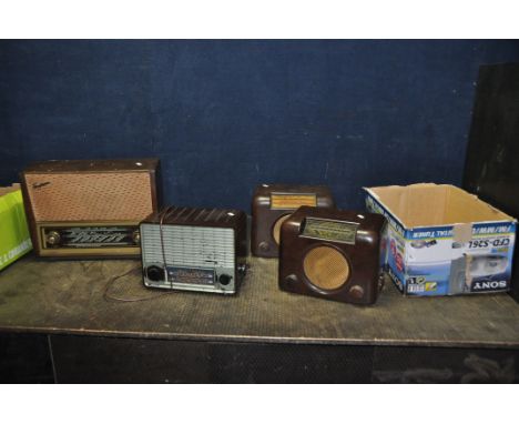 FOUR MID 20th CENTURY VALVE RADIOS comprising of a Bush DAC90A in brown Bakelite case, a similar if not identical valve radio