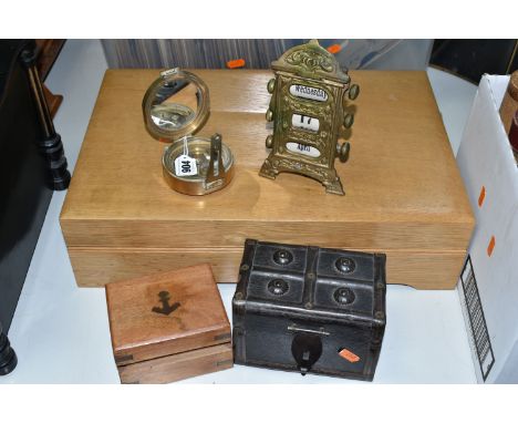 A REPRODUCTION BRASS BRUNTON STYLE SURVEY COMPASS, together with wooden box, to also include a vintage brass perpetual desk c