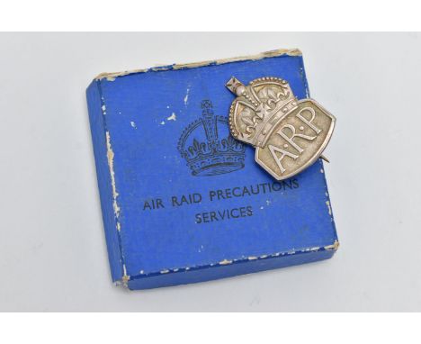 A SILVER 'A.R.P' BADGE, hallmarked 'Royal Mint' London 1938, fitted with pin and C clasp, approximate gross weight 9.1 grams,