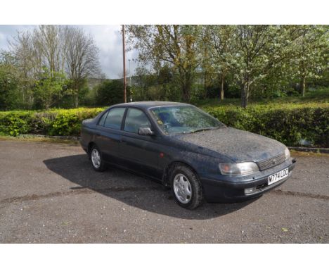 A 1994 TOYOTA CARINA E EXECUTIVE A FOUR DOOR SALOON CAR in blue, first registered 30/9/1994 under plate number M774 LOC, 2 li