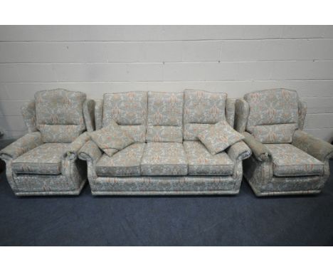 A BEIGE AND FOLIATE THREE PIECE LOUNGE SUITE, comprising a three seater sofa, length 173cm x depth 92cm x height 90cm, along 