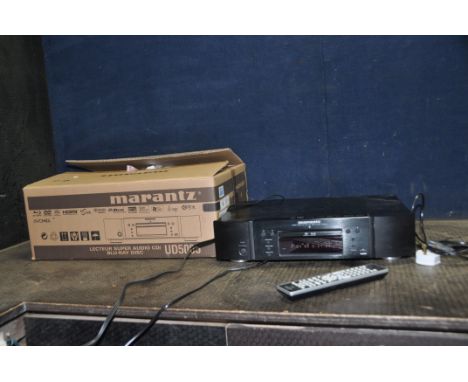 A MARANTZ UD-5005 SUPER AUDIO CD AND BLU RAY PLAYER with original packaging and remote (PAT pass and working)and a Marantz UD