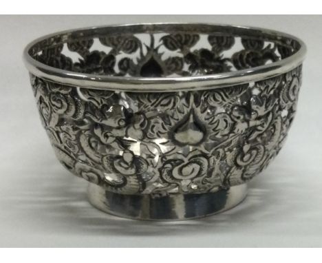 A Chinese silver pierced bowl. Marked to base. Approx. 77 grams. Est. £60 - £80.