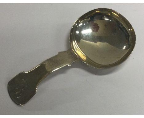 A George III silver caddy spoon. London 1817. Approx. 11 grams. Est. £50 - £80.