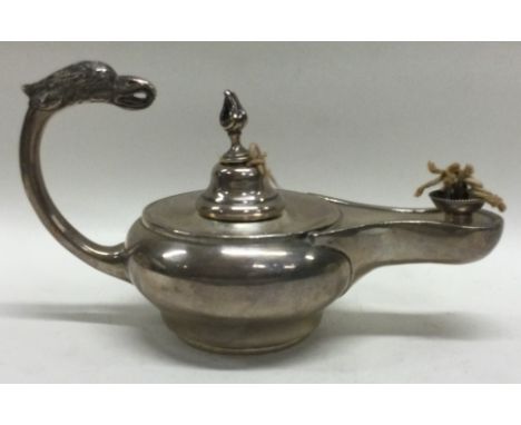 GARRARD & CO: A silver Aladdin's lamp. London 1902. Approx. 155 grams. Est. £100 - £150.