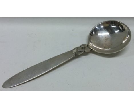 GEORG JENSEN: A silver sauce ladle of typical stylised design. Approx. 52 grams. Est. £50 - £80.