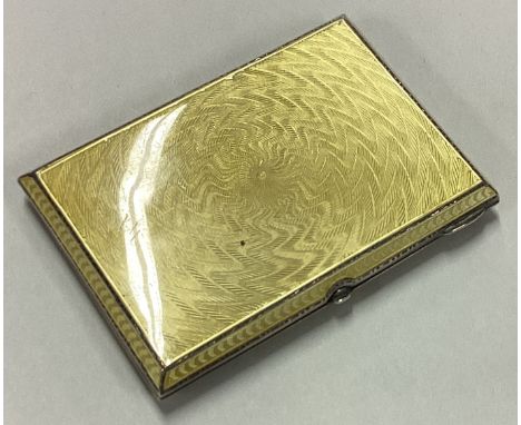 A silver and yellow enamelled cigarette case. Birmingham 1931. Approx. 88 grams. Est. £150 - £200.