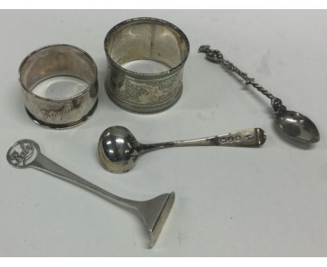 A silver napkin ring, salt spoon etc. Approx. 71 grams. Est. £20 - £30.