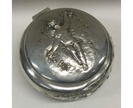 A good quality cast silver tea caddy decorated with winged infants. Approx. 246 grams. Est. £100 - £150.
