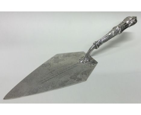 EXETER: A silver presentation trowel. 1863. By J&J Williams. Approx. 185 grams. Est. £200 - £300.