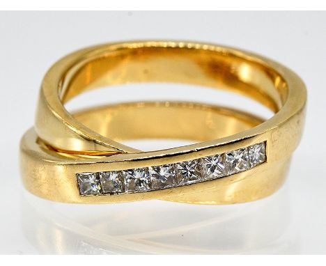   Massiver Doppelring mit 8 Diamanten, zusammen ca. 0,8 ct, von Juwelier Christ, 20. Jh.  585/- Gelbgold. Gesamtgewicht ca. 1