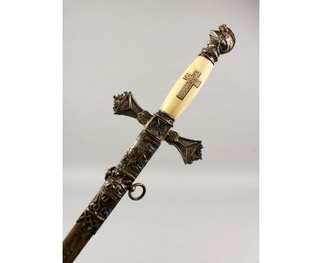 A MASONIC SWORD WITH SCABBARD, with engraved ivory handle. 38.5ins long overall.