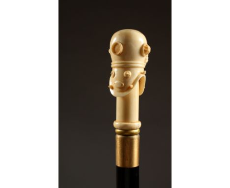 A BONE HANDLED WALKING STICK, carved as a divers helmet. 36.5ins long.