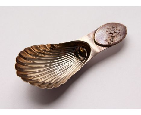 A GEORGE III SHELL CADDY SPOON. Maker: N.S. &amp; Co.