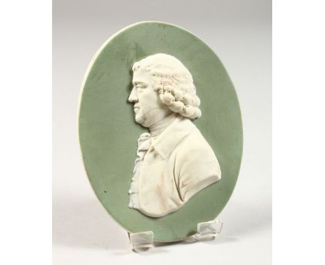 A WEDGWOOD GREEN AND WHITE OVAL JASPER WARE PORTRAIT PLAQUE. Impressed WEDGWOOD.  4.5ins x 3.5ins.