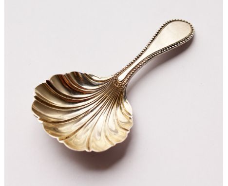 A VICTORIAN CADDY SPOON. Sheffield 1875.  Maker: Martin Hall &amp; Co.