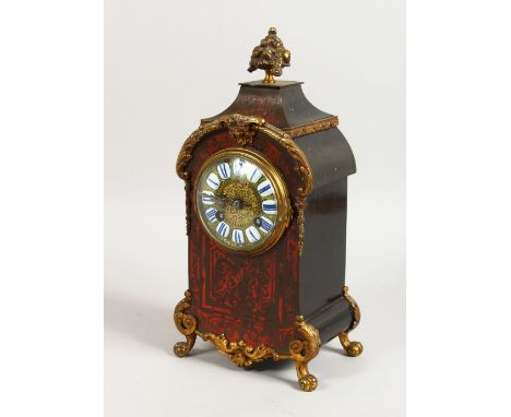 A 19TH CENTURY FRENCH "BOULLE" AND ORMOLU MANTLE CLOCK. 12ins high.