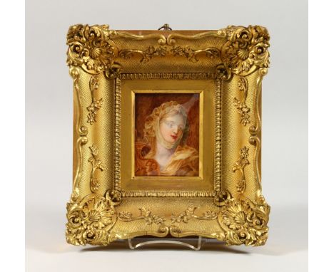 AFTER GUIDO RENI, A PORTRAIT MINIATURE OF A YOUNG LADY, in a decorative gilt frame. Frame 10ins x 9ins.