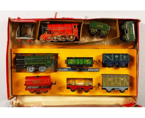 AN "O GAUGE" TINPLATE CLOCKWORK GOODS TRAIN SET, boxed.