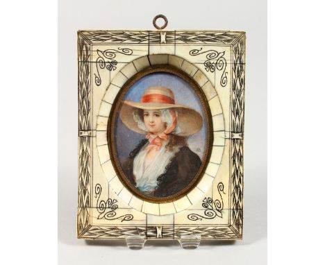 A LATE 19TH CENTURY OVAL PORTRAIT MINIATURE of a young lady wearing a broad brimmed hat, in an ivory frame. 5.5ins x 4.5ins.