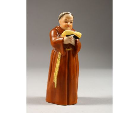 A ROYAL WORCESTER MONK CANDLE SNUFFER. 4.75ins high.