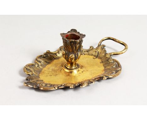A SILVER GILT CHAMBER CANDLESTICK.