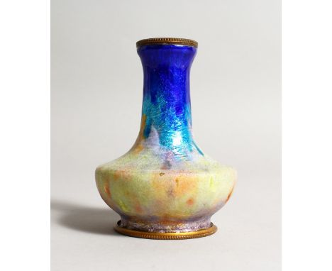 AN ART NOUVEAU ENAMEL VASE. 4ins high.