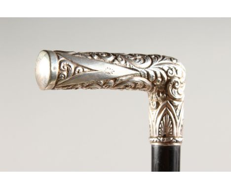 A GOOD SILVER HANDLED WALKING STICK with acanthus decoration. London 1953. 3ft long.