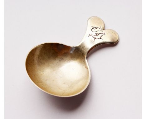 A GEORGE III CADDY SPOON. London 1812.  Maker: W.E., in an oval.