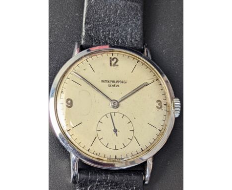 A Patek Philippe gents wristwatch, ref.1513, 1951, 35mm, stainless steel case, dial and movement signed, silvered dial with A