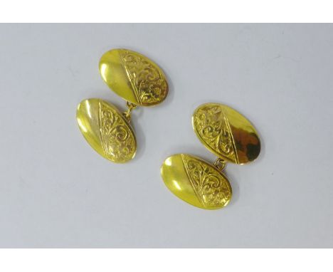 A pair of 9ct gold foliate engraved cufflinks, stamped 375 with Chester hallmark (approx 7.9 grams)