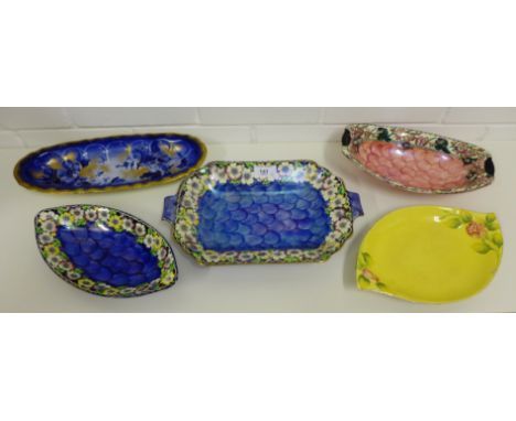 A group of three Maling thumb print a floral patterned serving dishes together with a flow blue dish and a Royal Winton dish 