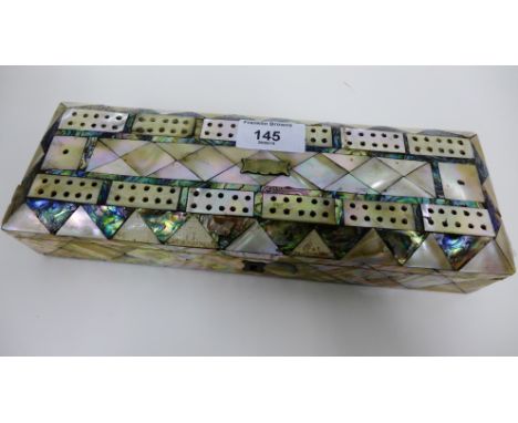 Mother of pearl and abalone inlaid rectangular box, the hinged top with cribbage markers, 27 x 10cm