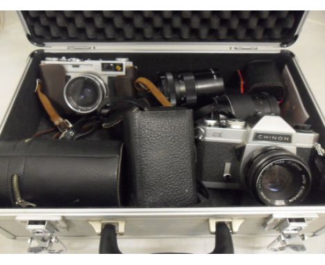 2 VINTAGE CAMERAS AND LENSES IN HARD CASE