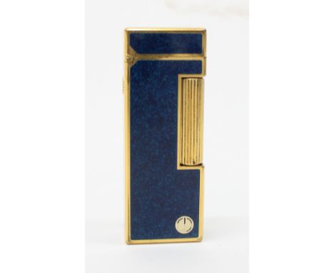 A Dunhill Rollagas 'Blue sapphire' and gold-plated pocket lighter with blue lacquered panels, maker's marks and 'Swiss made',