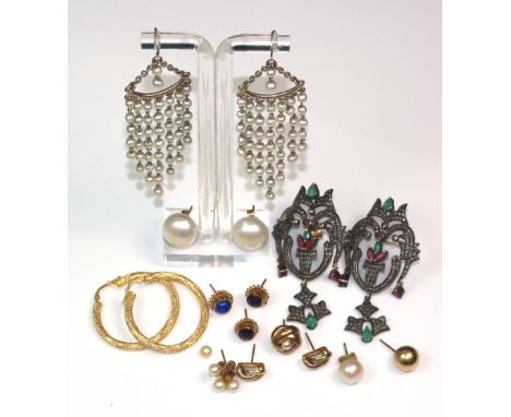 A collection of mostly gem set earrings; comprising; a pair of rose diamond, ruby and emerald floral spray earrings, a pair o