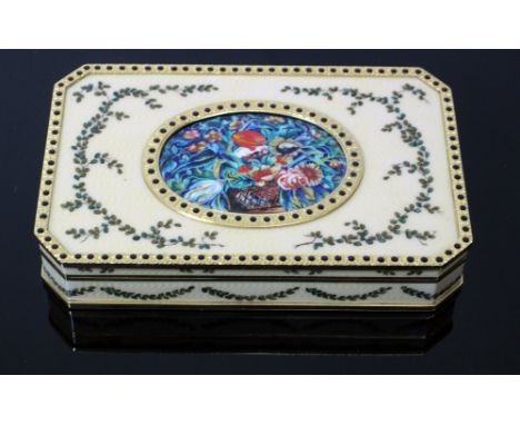 An Italian gold engine turned and enamel box, 20th century, of canted rectangular outline, centred by an oval foliate enamel 