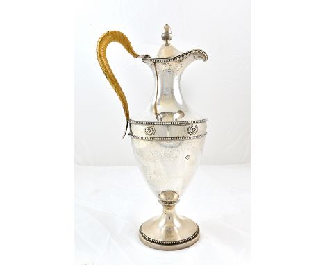 A George III silver classical vase shape water jug, Robert Makepeace & Richard Carter, London 1778, with beaded borders and a