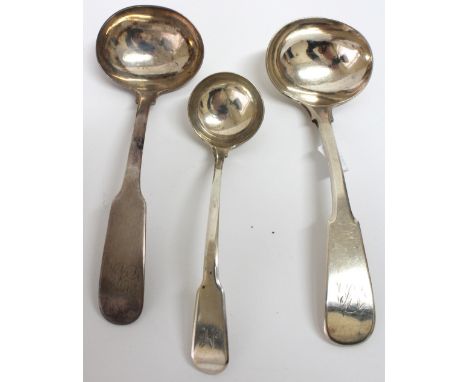 Newcastle:  A pair of George III fiddle pattern silver sauce ladles, Thomas Watson, a similar silver toddy ladle, John Robert