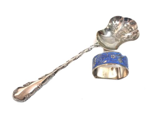 A pretty silver and blue guilloche enamel 'D' shape napkin ring, Jones & Crompton, Birmingham 1931 and an attractive silver f