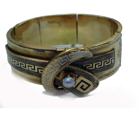 A Victorian gold, enamel and pearl broad bangle in the form of hollow articulated panels, the front designed as a stylised be