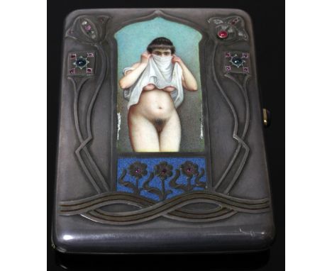 A Russian silver, enamel and gem set cigarette case, early 20th century, the cover centred by a mihrab shaped arch enclosing 