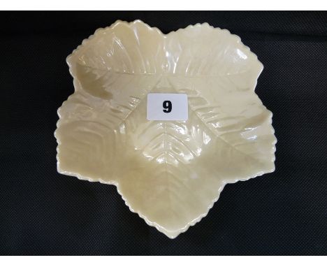 Belleek cream dish in the form of a Leaf, green back stamp to base, 15cm in diameter, Condition - light chipping 