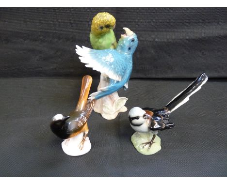 Goebel Budgerigar group of Blue and green on naturalistic base marked CV95 1968, 16.5cm in height and 2 Goebel birds