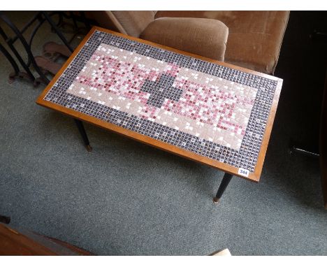 Interesting 1960s Tile topped coffee table on slender legs, 82cm in Length