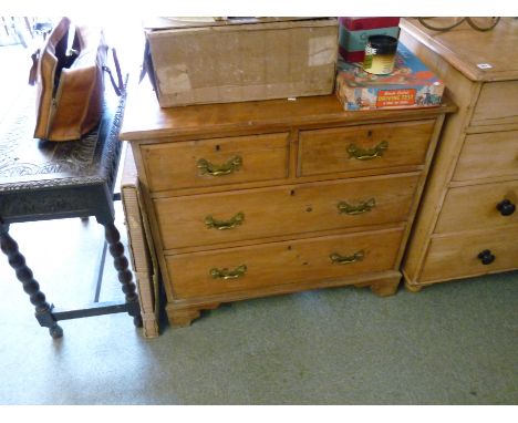 20thC Pine chest of 2 over 2 drawers with brass drop handles, supported on bracket feet